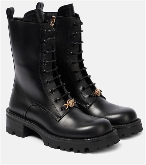 versace bottes|Versace lace up boots.